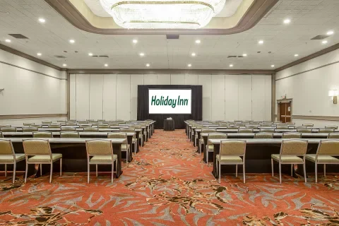 our emerald ballroom showing set up theater style with stage