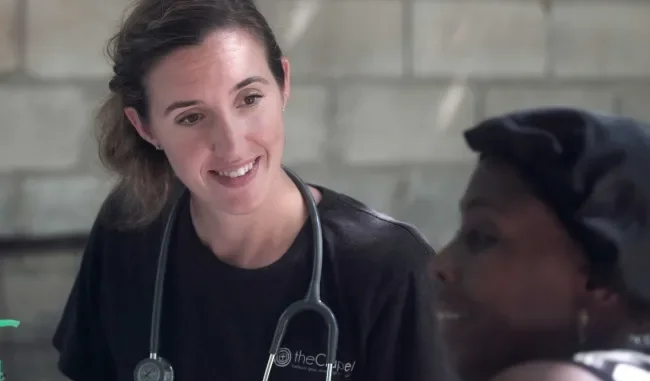 photo of a medical professional talking to a patient